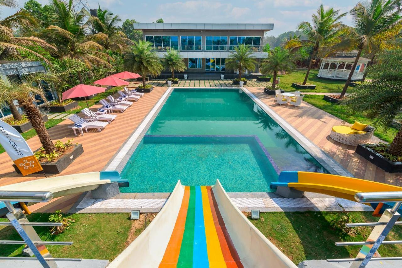Saffronstays Palm Paradise, Kalyan Khadavli - Swimming Pool With Water Slides, Gazebo And Indoor Games Padghe Extérieur photo