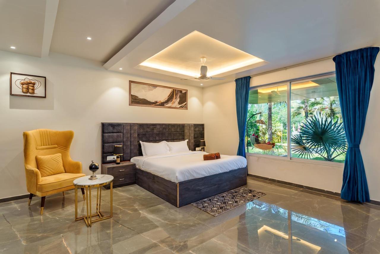 Saffronstays Palm Paradise, Kalyan Khadavli - Swimming Pool With Water Slides, Gazebo And Indoor Games Padghe Extérieur photo