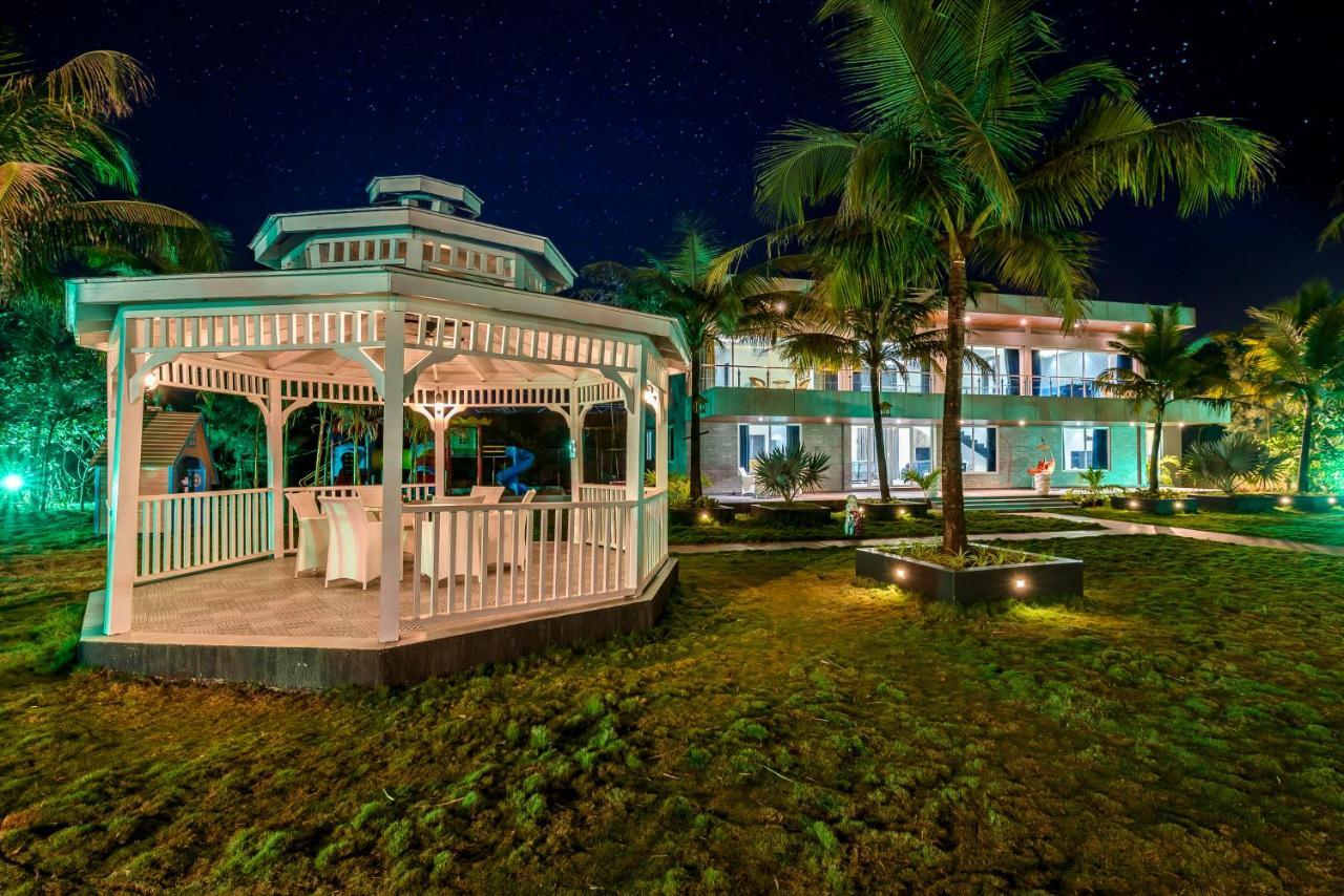 Saffronstays Palm Paradise, Kalyan Khadavli - Swimming Pool With Water Slides, Gazebo And Indoor Games Padghe Extérieur photo